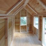 Inside of a Customisable wooden playhouse for kids in garden - Artisan Deco - Made in the UK